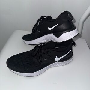 Nike Flyknit Black and White Athletic Shoes